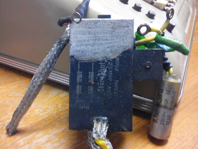 Filter (on the left) and RC filter (on the right) - both damaged